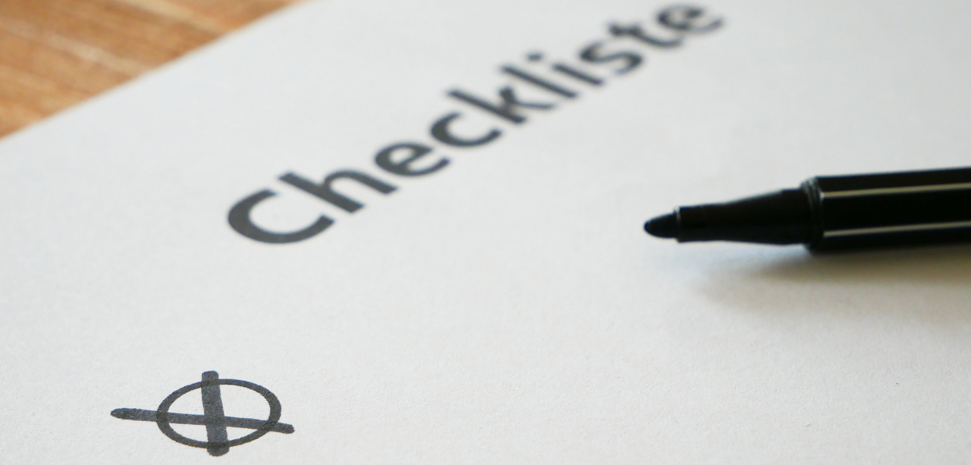 Ein Dokument mit Aufschrift "Checkliste".